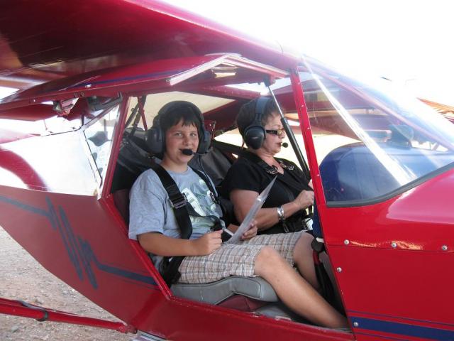 My 11 y.o. grandson Dane is an excellent co-pilot, running the checklist and at the controls inflight.  June 2010