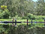 Long boats on a river on the south coast of Papua where I flew the float planes.