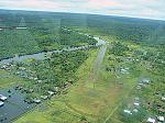 This is the village of Kamur during rainy season. The airstrip is mostly submerged in water. Good thing I was flying a float plane.