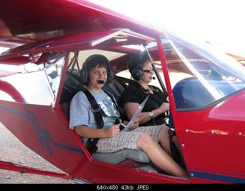 My 11 y.o. grandson Dane is an excellent co-pilot, running the checklist and at the controls inflight.  June 2010